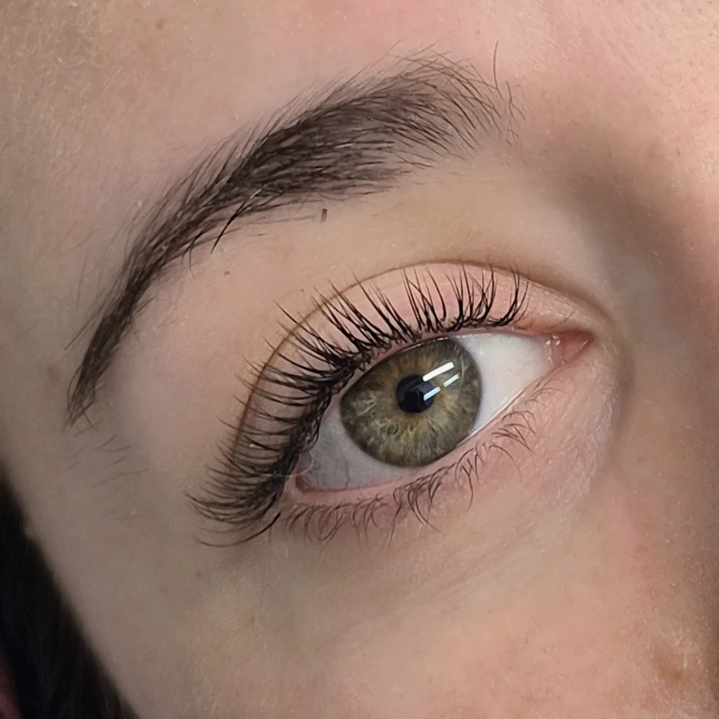 Close up of a natural lash lift and groomed brow by Get Lash and Beauty